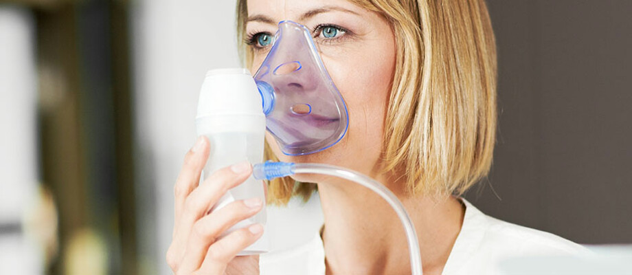 O dispositivo de inalação da Microlife para terapia de asma, bronquite crónica e outras doenças respiratórias.